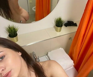 Russian teen Emily Mayers showing her great ass while taking nude selfies