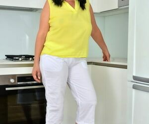 Obtuse mature lady Ria Unconscionable strips completely overt in her kitchen