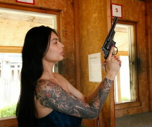 Crestfallen Tera Patrick holding her gun & way her big guns plus big heart of hearts
