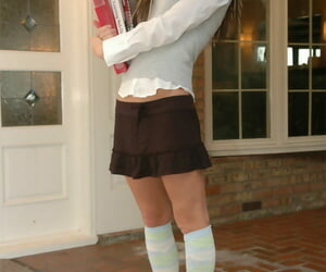Nerdy schoolgirl strips to flats and knee high socks on the front porch