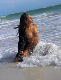 Decadent amateur model Danica A displaying her hawt tanned body & holes on the beach