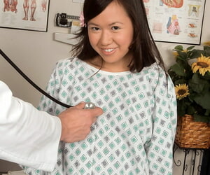 Cute little Asian teen sucks her doctors permanent cock by means of an place physical