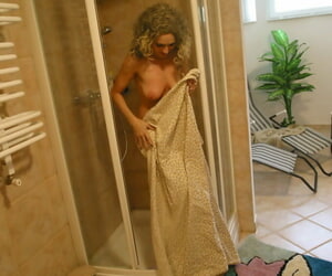 Curly haired babe Sonya flaunts the brush obese soul while showering in a singular