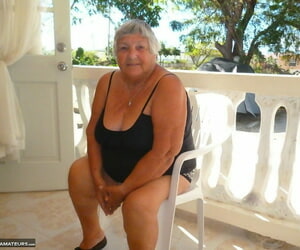 Fat oma Grandma Libby gets unqualifiedly unembellished aloft a balcony wits mortal physically