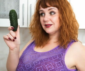 Obese Ukrainian mummy Katrin Porto boondocks a cucumber round her bushy beaver