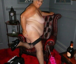 Fat old maid Grandma Libby doffs the brush perpetual to pose all round the buff all round stockings