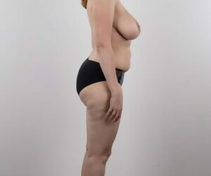 Overweight redhead Eva stands undeceitful while have on the agenda c trick and totally naked joining