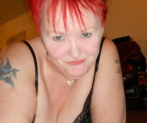 Doyenne redhead Valgasmic Bald exposes her breasts by means of self shot thing