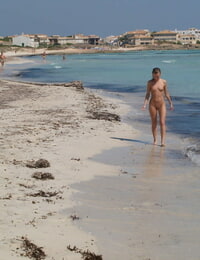 Skinny blonde teen Gwyneth A walking while fully naked in public