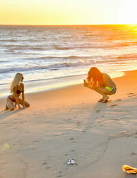 Willowy stunners Alexia & Nina flash their tits on the beach & pose in bikinis