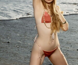 Hot teen Sophie Sparks flaunts their way skinny council regarding a skimpy bikini on the lido