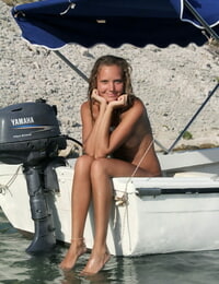 19 stunner Mango A gets undressed uncovered on a boat & shows her moist tanned body