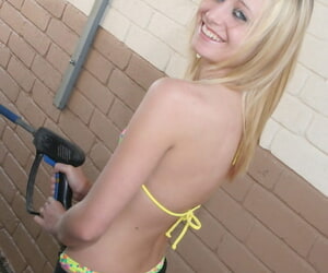 Beauteous girl increased by will not hear of girlfriend wash a truck at an obstacle car wash here revealing bikinis