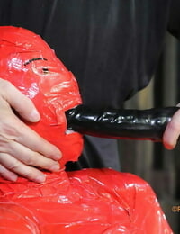 S&m buff Claire Adams mummified in latex and brutally tortured