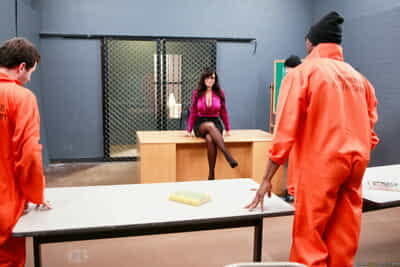 Horny MILF Lisa Ann shows her big juggs and gets rammed by three prisoners