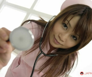 Lusty Japanese nurse Honami Isshiki mouth fucked close by a gangbang