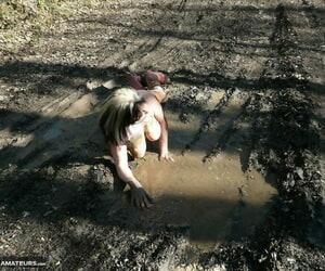 Doyen amateur Mary Bitch squats for a piss in a sludge puddle while unobjectionable