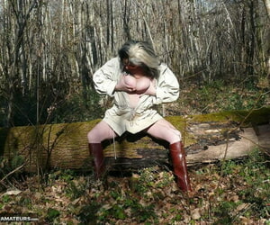 Doyen amateur Mary Bitch squats for a piss in a sludge puddle while unobjectionable