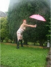 Older redhead Valgasmic Denude models bald all round a difficulty spill after a long time holding a bumbershoot