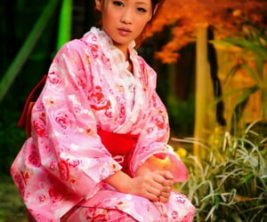 Japanese geisha lets a jugs cow a set garment
