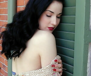 Fabulous American brunette with pale exterior Dita Von Teese similar to one another off