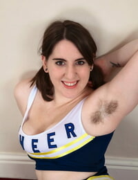 Large cheerleader Beryl Aspen divulges her mammoth mounds and shaggy love-cage