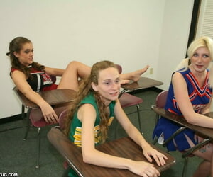 Three naughty cheerleaders show off their blowjob skills in the classroom