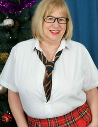 Mature British lady Speedy Bee toys are cunt at Xmas in schoolgirl apparel