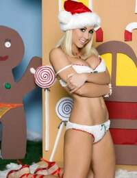 Cute blonde Jessica Lynn poses for a centerfold spread with an Xmas theme