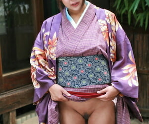 Japanese womanlike lifts up chum around with annoy brush caftan for a hardly ever panty upskirt on chum around with annoy patio