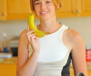 Short haired teen hikes short dress and inserts toys and banana into damp cunt