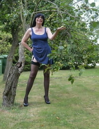 Brunette amateur Barby Slut gets naked in nylons in various rural locations
