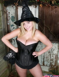 Busty young cosplay witch Tegan Brady teases hotly with her lovely big tits