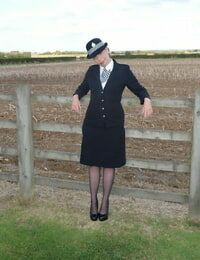 Of age cop Barby Slut removes her uniform against a fence on tap a plough