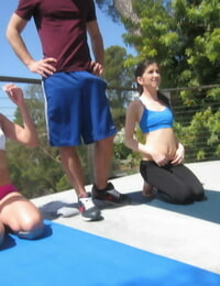Fit teens seduce the yoga instructor with the bulging cock in his pants