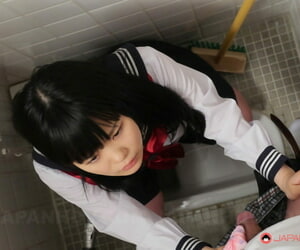 Sexy Japanese teen Sayaka Aishiro giving a gentle blowjob in a public toilet