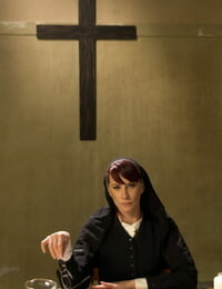 Sexually aroused nun Maitresse Madeline Marlowe punishes and spanks a submissive priest