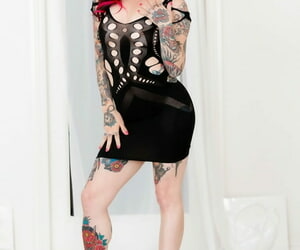 Tattooed MILF Joanna Angel hikes her sexy dress & spreads her legs & pussy