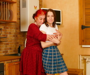 Elderly redhead coupled with the brush young lesbian follower groupie fist coupled with dildo ever others vaginas