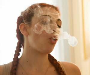 Redhead teen Gina Rosini smokes with an increment of shows say no to big breasts indoors