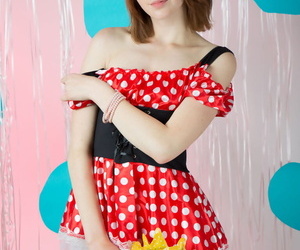 Petite young girl poses in the nude wearing Minnie Mouse ears only