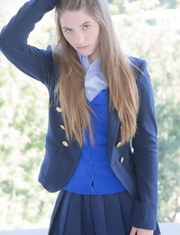 Naughty schoolgirl in uniform makes the grade on her knees