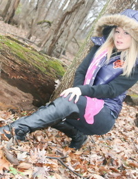 Amateur girl Meet Madden exposes a pink bra while in the woods on a chilly day