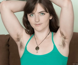 Amateur model proudly shows off her unshaven underarms and pussy