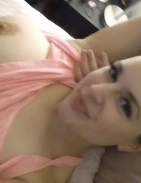 Massive titted young takes naked and semi-nude selfies around her residence