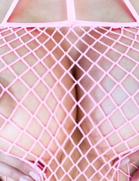 Dark haired teen Kendra Spade spreads her twat lips after removing mesh attire