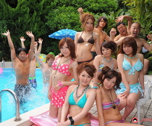 Sweet Japanese girlfriends in sexy swimsuits flaunt their beauty poolside