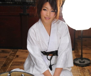 Undevious Japanese babe Nene Nagasawa posing in the air her lovely lounging robe