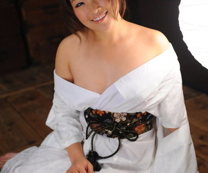 Undevious Japanese babe Nene Nagasawa posing in the air her lovely lounging robe