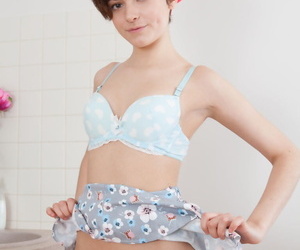 Nice teen Melody wears her hair short by means of revealed modelling Rather commence
